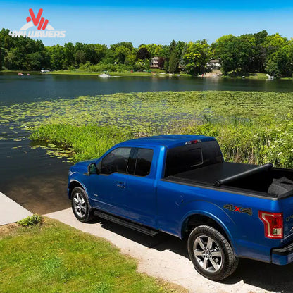 TruXedo Lo Pro soft roll-up tonneau cover on a 2009-2014 Ford F-150 with 5.5-foot bed, showing low-profile rail detail.