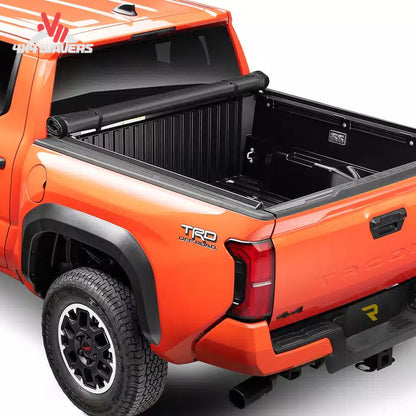Jeep Gladiator tonneau cover rolled up to provide unrestricted access to the cargo bed