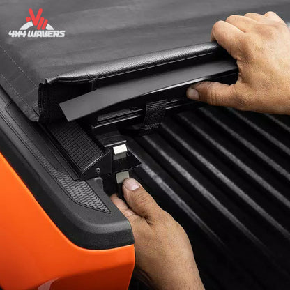TruXedo Lo Pro soft roll-up tonneau cover on a 2009-2014 Ford F-150 with 5.5-foot bed, installed on truck bed for protection.
