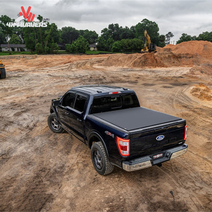 TruXedo Pro X15 soft roll-up tonneau cover installed on a 2009-2014 Ford F-150 with 6.5-foot bed, showing the cover rolled back.