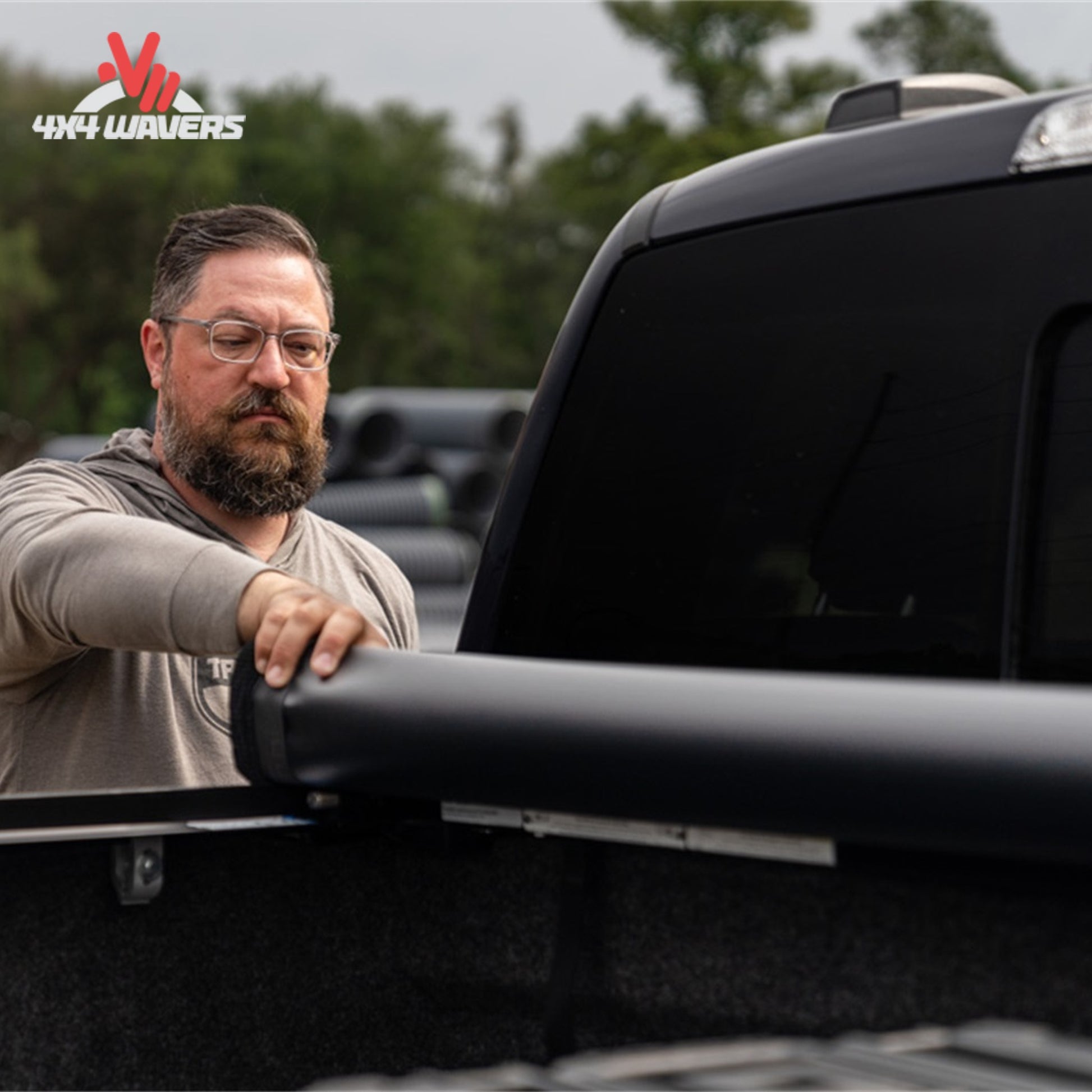 Truxedo Pro X15 soft roll-up tonneau cover on a 2009-2014 Ford F-150 with 6.5-foot bed, showing full bed access and trigger latch.