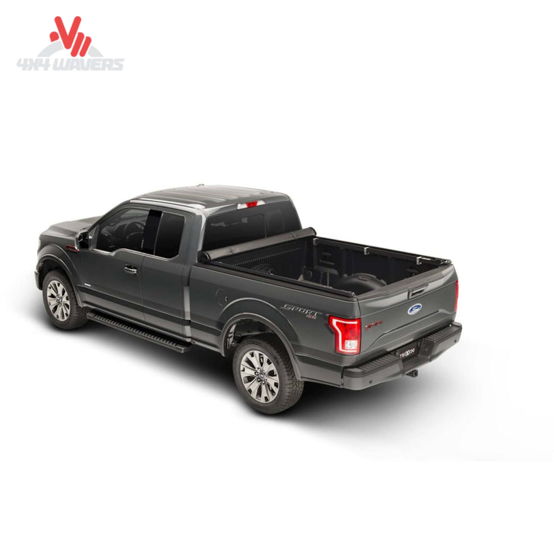 TruXedo TruXport soft roll-up tonneau cover with dual paddle latch on a 2009-2014 Ford F-150 5.5' bed, rolled open.
