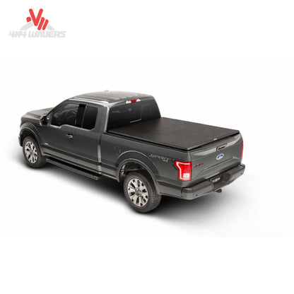 TruXedo TruXport soft roll-up tonneau cover on a 2009-2014 Ford F-150 with 5.5-foot bed, showcasing its sleek design.