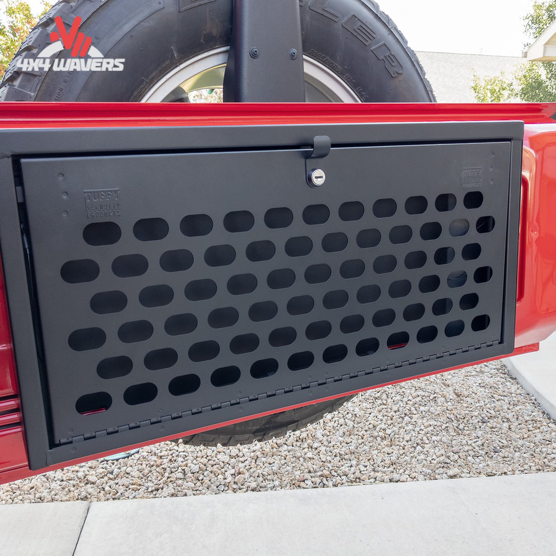 MOLLE attachment system designed to hold pouches, recovery tools, and trail gear on a Jeep tailgate
