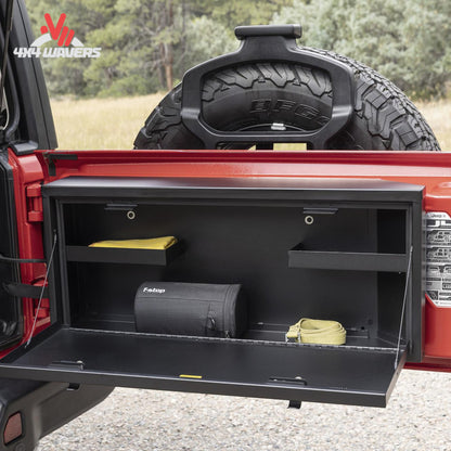 Heavy-duty Tuffy steel tailgate storage lockbox installed on a Jeep Wrangler JL for secure overland gear storage