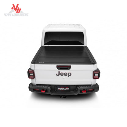 Aircraft-grade aluminum tonneau panel with carpeted underside finish