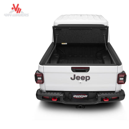 UnderCover Ultra Flex folded open providing full Jeep Gladiator bed access