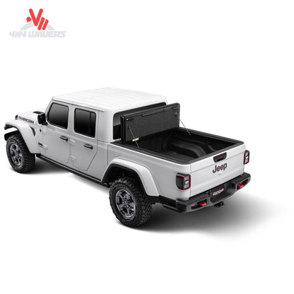 UnderCover Ultra Flex folded open providing full Jeep Gladiator bed access