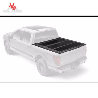 UnderCover Flex Hard Folding Tonneau Cover on a 2004-2014 Ford F-150 with 6.5-foot bed, shown folded open on the truck bed.