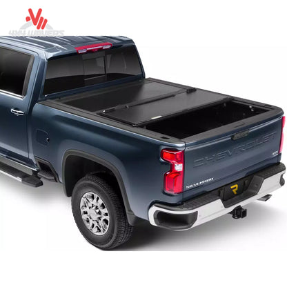 UnderCover Flex Hard Folding Tonneau Cover on a 2004-2014 Ford F-150 with 6.5-foot bed, shown folded on the truck bed.