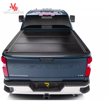 UnderCover Flex hard folding tonneau cover installed on a 2004-2014 Ford F-150 with 6.5-foot bed, showing the sleek, durable design.