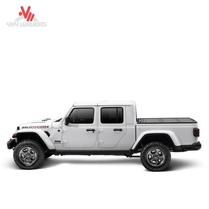 UnderCover Ultra Flex hard folding tonneau cover installed on 2020-2026 Jeep Gladiator JT