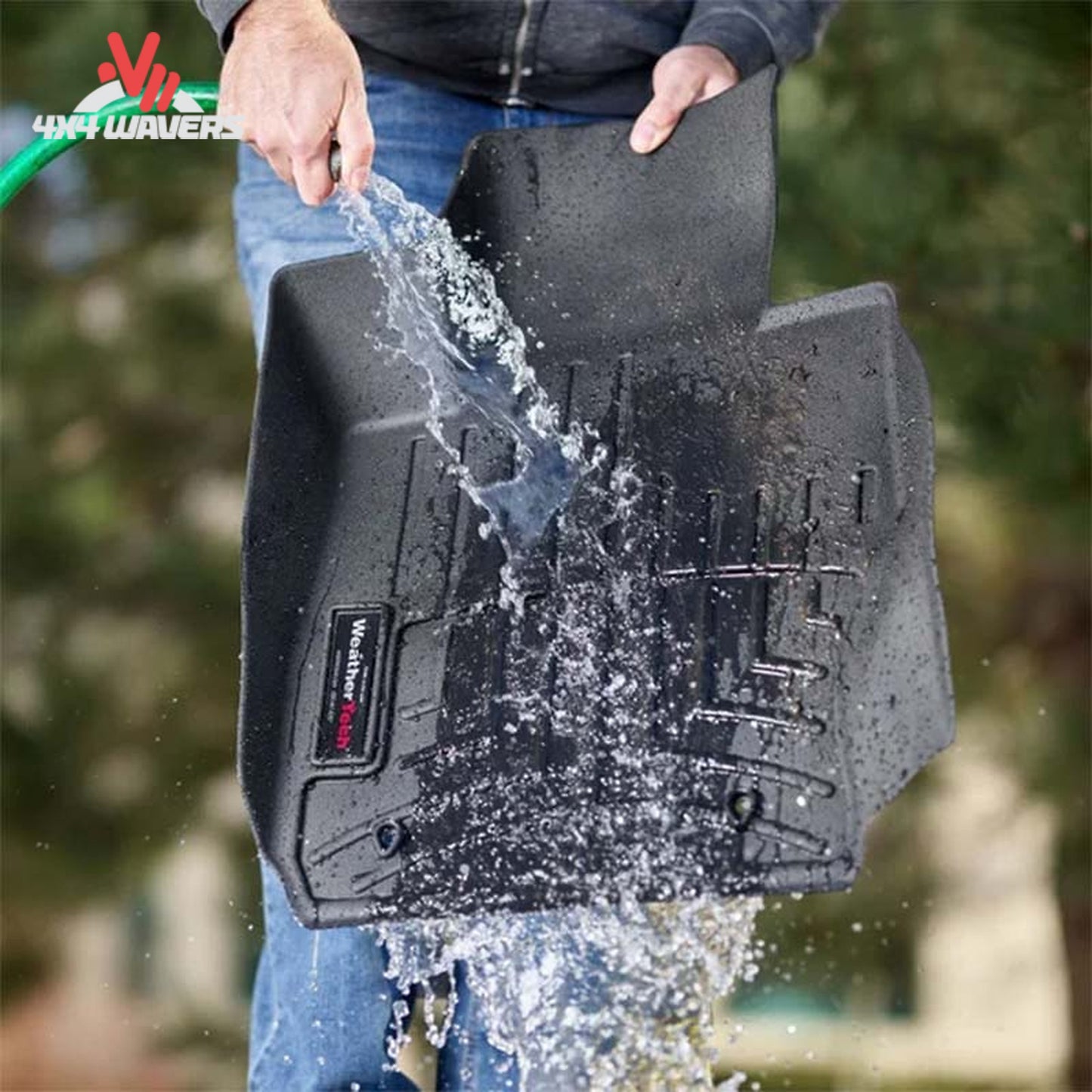 WeatherTech fluid channel design for water and mud containment