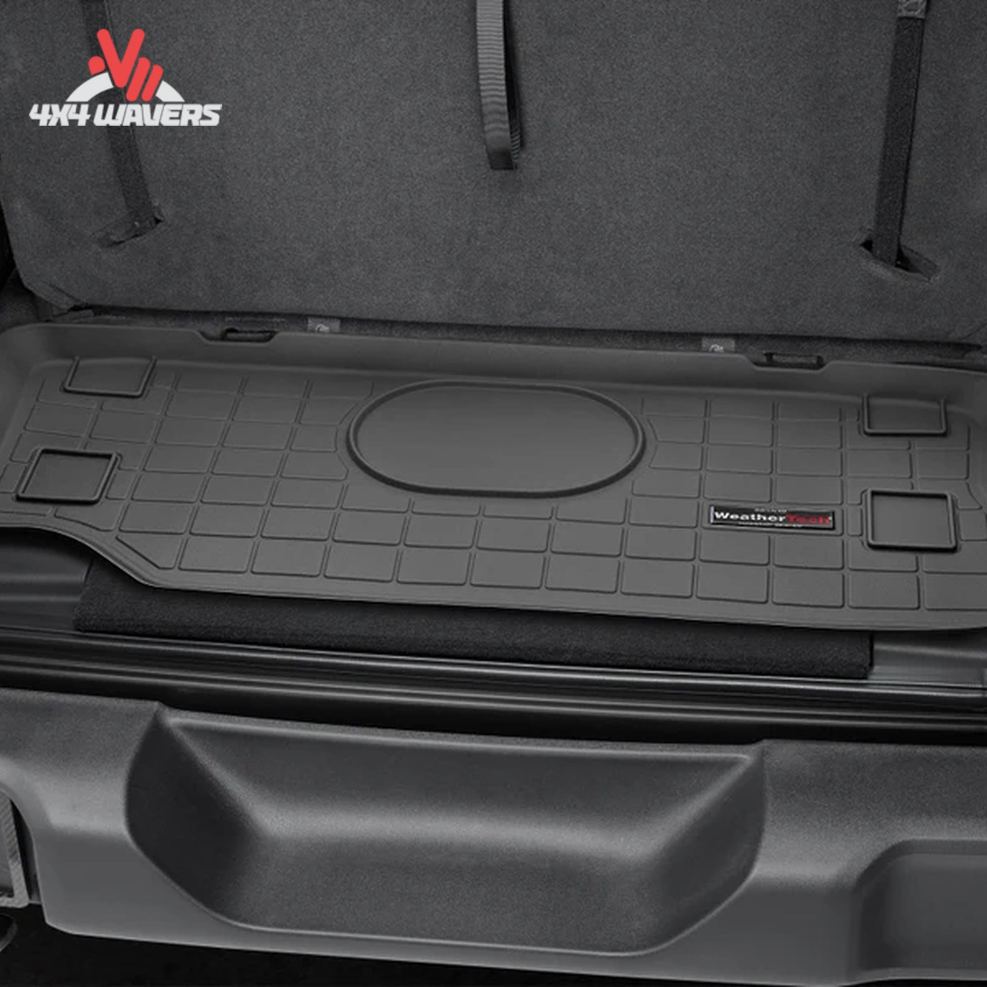 Custom-fit WeatherTech cargo liner protecting the rear cargo area of a Jeep Wrangler JL 2-door with rear seating removed