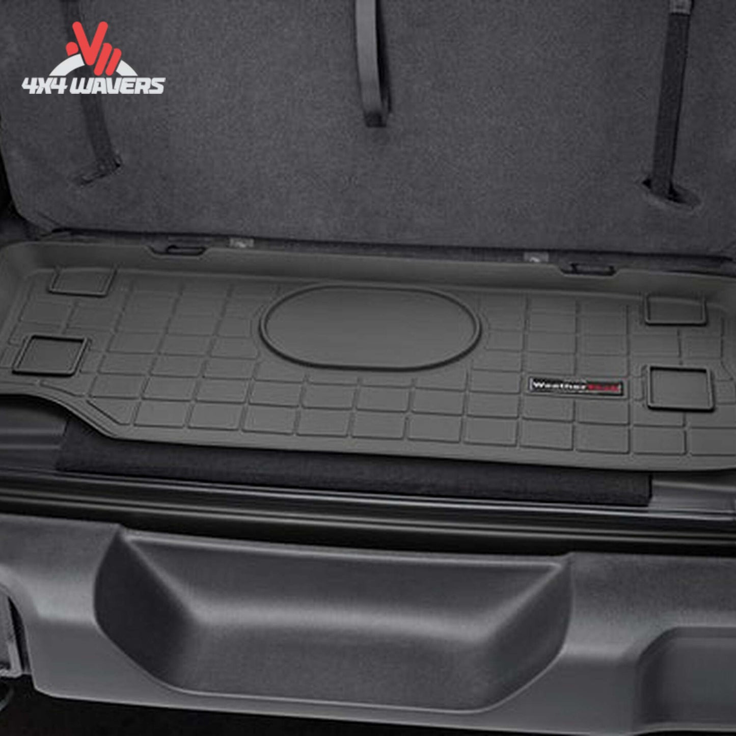 Custom-fit WeatherTech cargo liner protecting the rear cargo area of a Jeep Wrangler JL 2-door behind the front seats