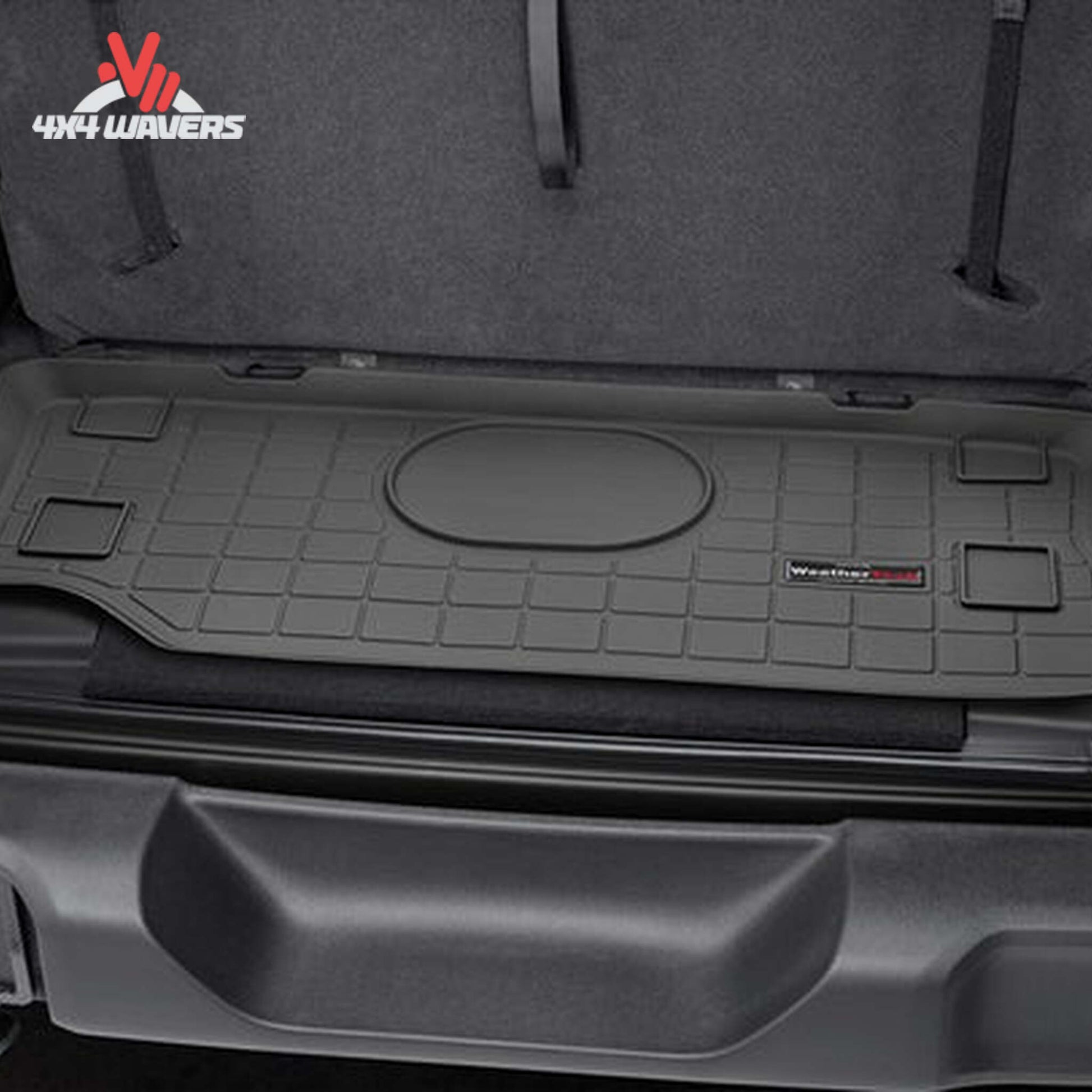 Custom-fit WeatherTech cargo liner protecting the rear cargo area of a Jeep Wrangler JL 2-door behind the front seats