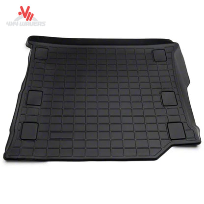 Jeep Wrangler JL Unlimited cargo compartment protected by a WeatherTech cargo liner designed for factory subwoofer applications