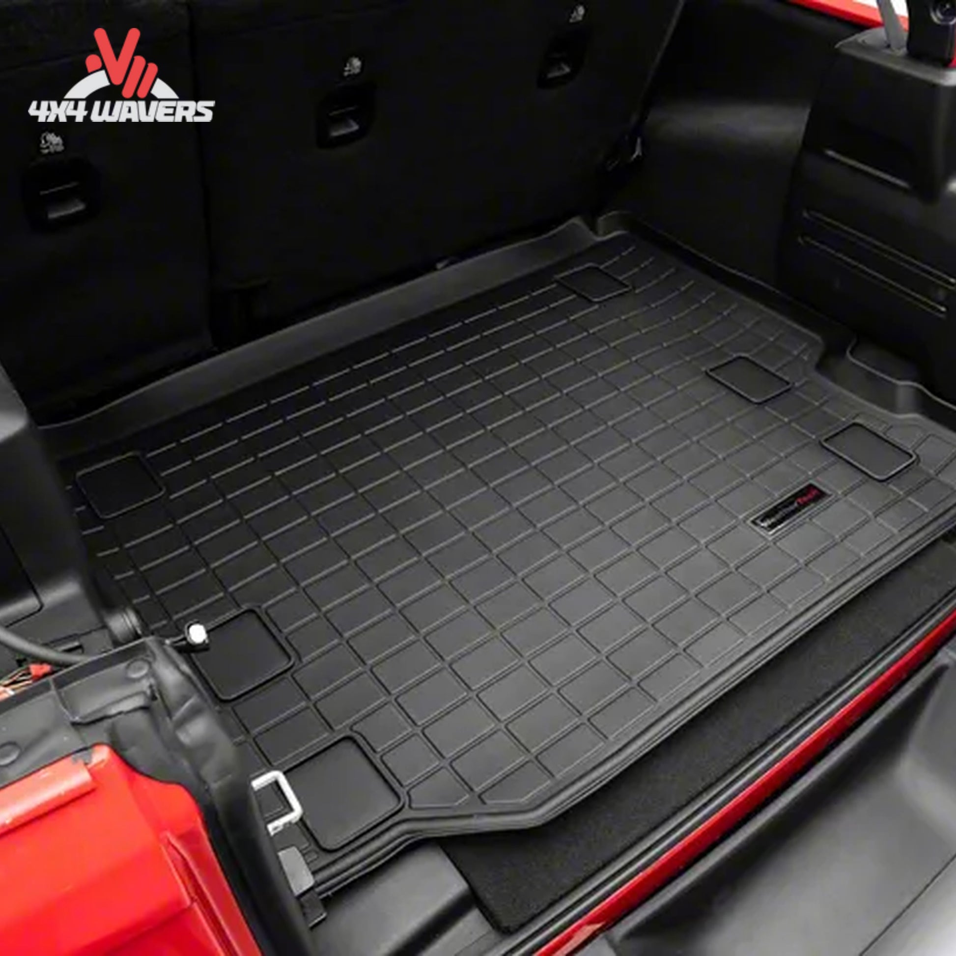 Custom-fit WeatherTech cargo liner installed in a Jeep Wrangler JL Unlimited with OEM cargo-area subwoofer and standard cargo floor