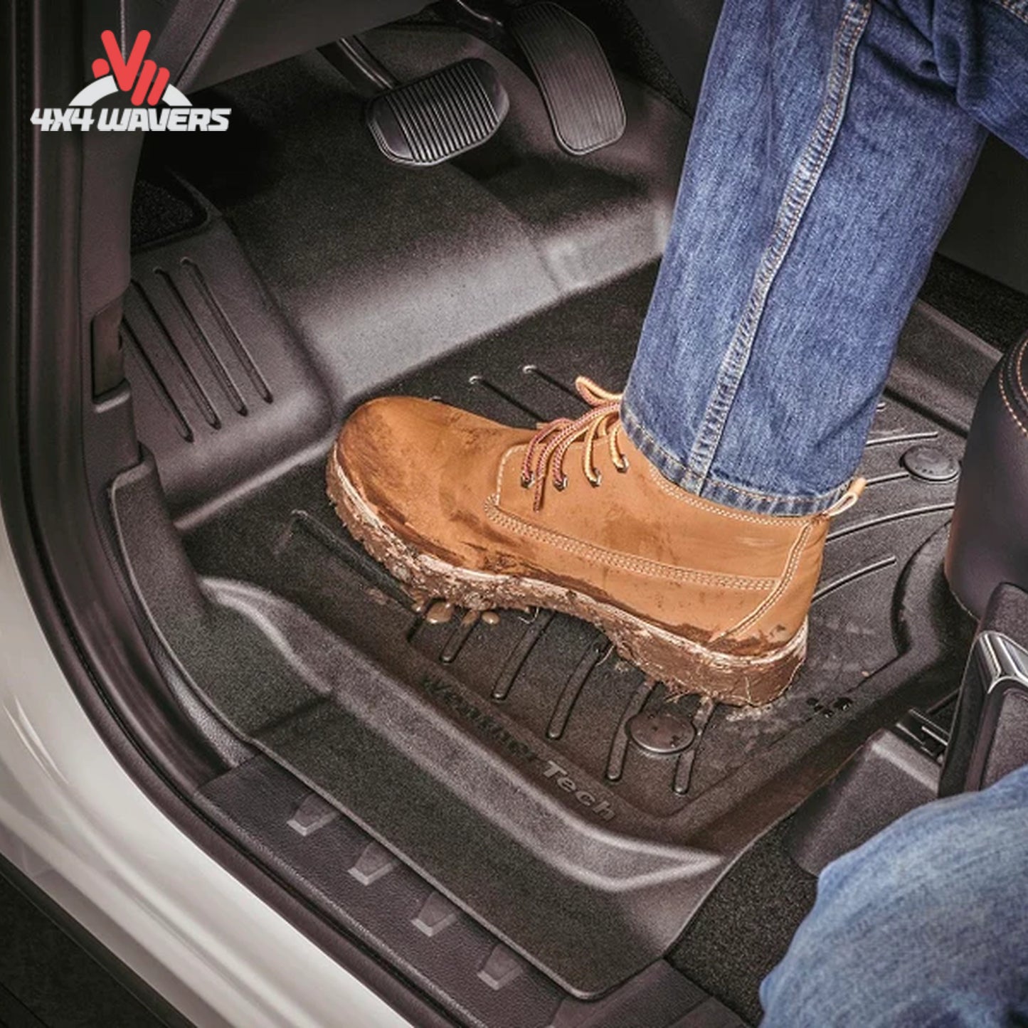 Full front-row WeatherTech floor protection showing raised sidewalls and custom fitment