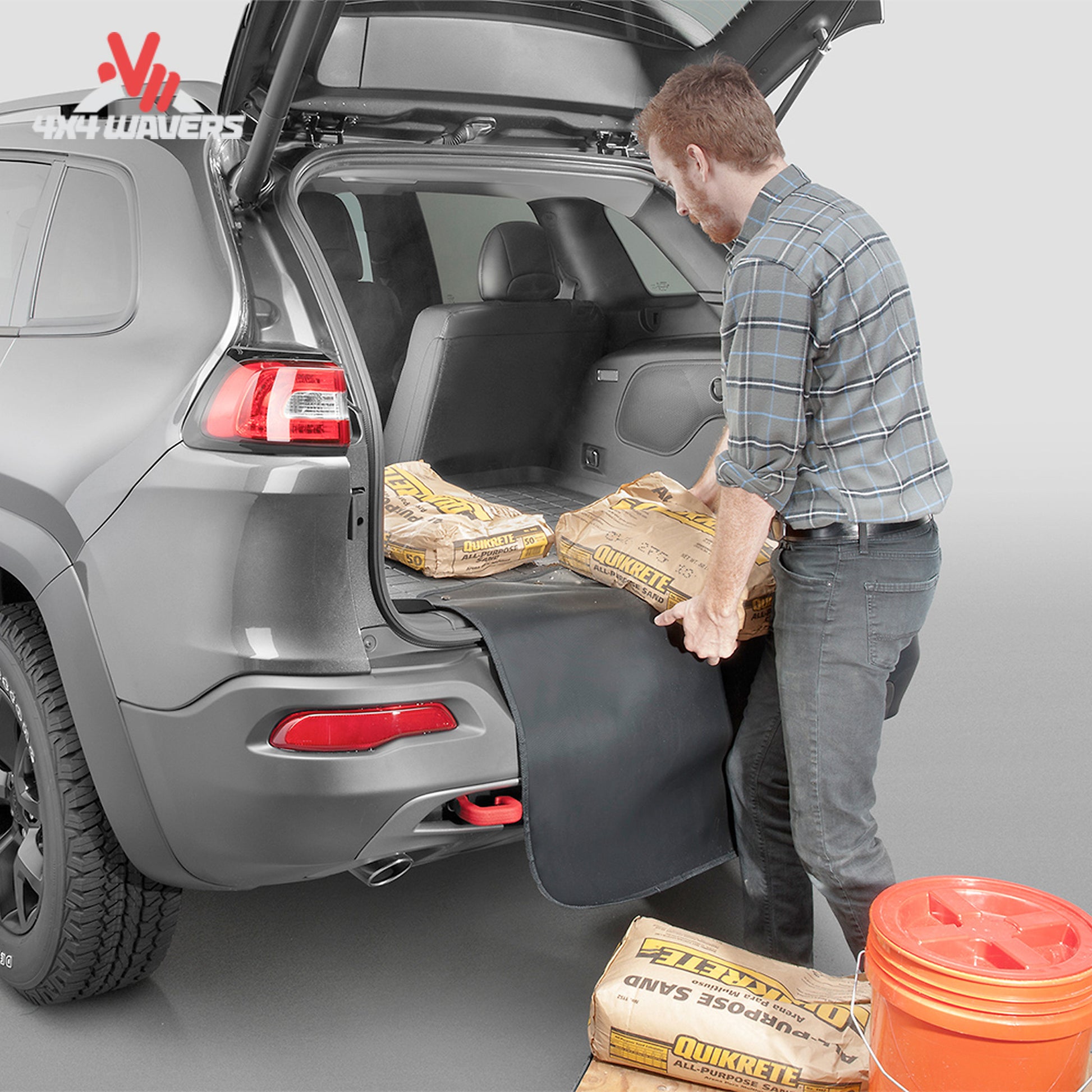 Fold-out bumper protector protecting Ford Bronco rear bumper during cargo loading