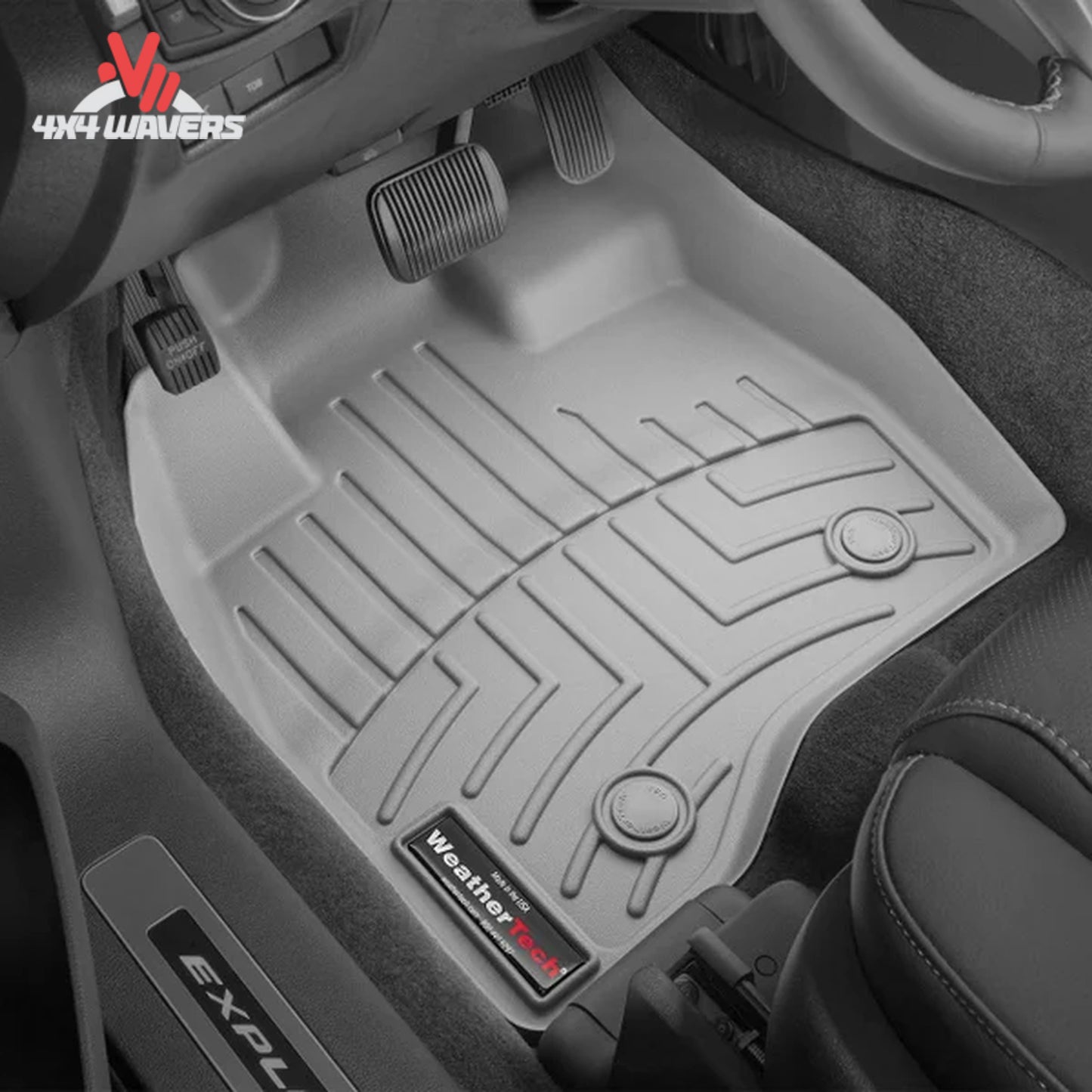 Driver and passenger footwell protected by WeatherTech all-weather floor mats inside a Jeep Wrangler JK