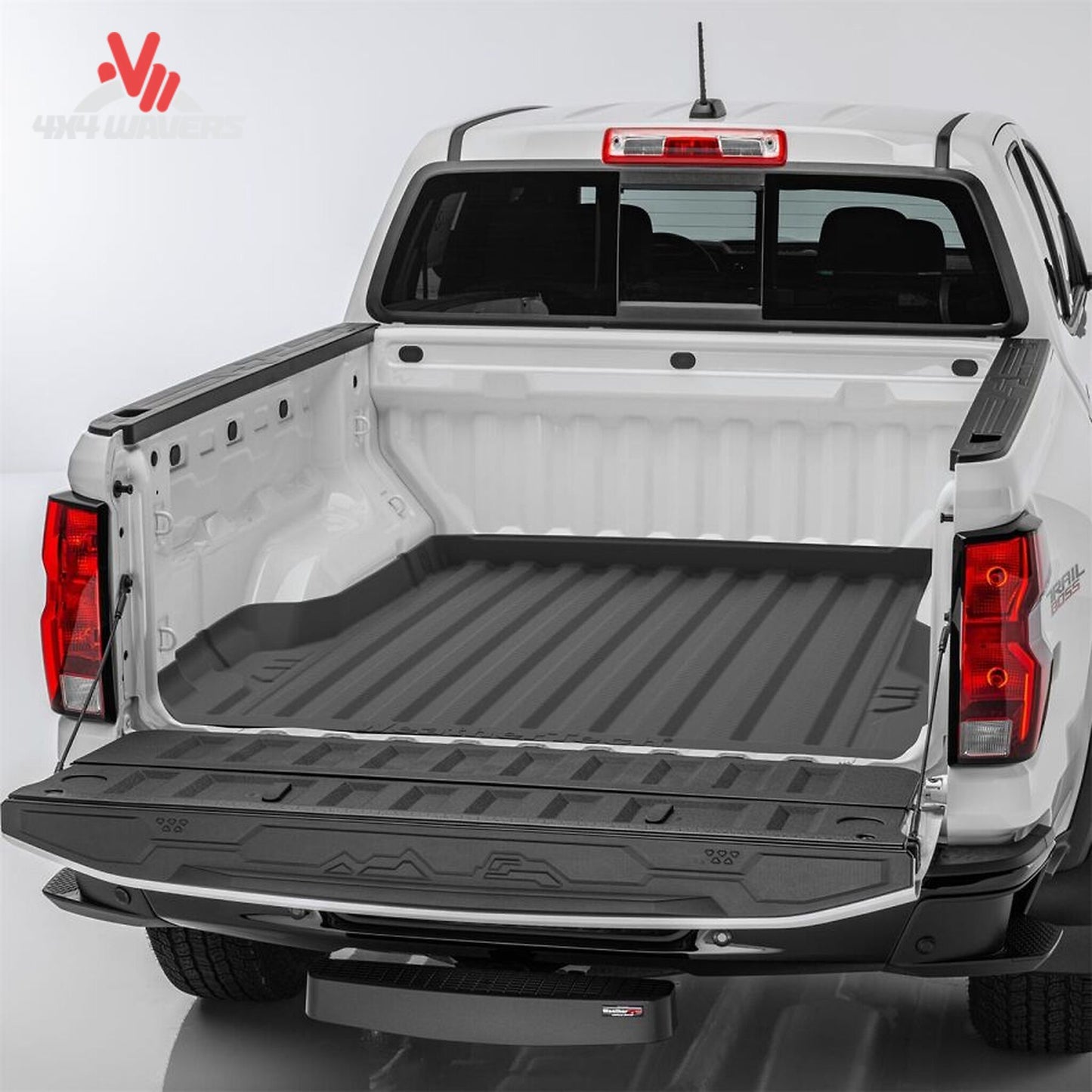 Top angle view of Ford F150 truck bed with installed black WeatherTech ImpactLiner mat 36907IM