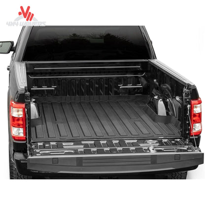 Top angle view of Ford F150 truck bed with installed black WeatherTech ImpactLiner mat 36913IM