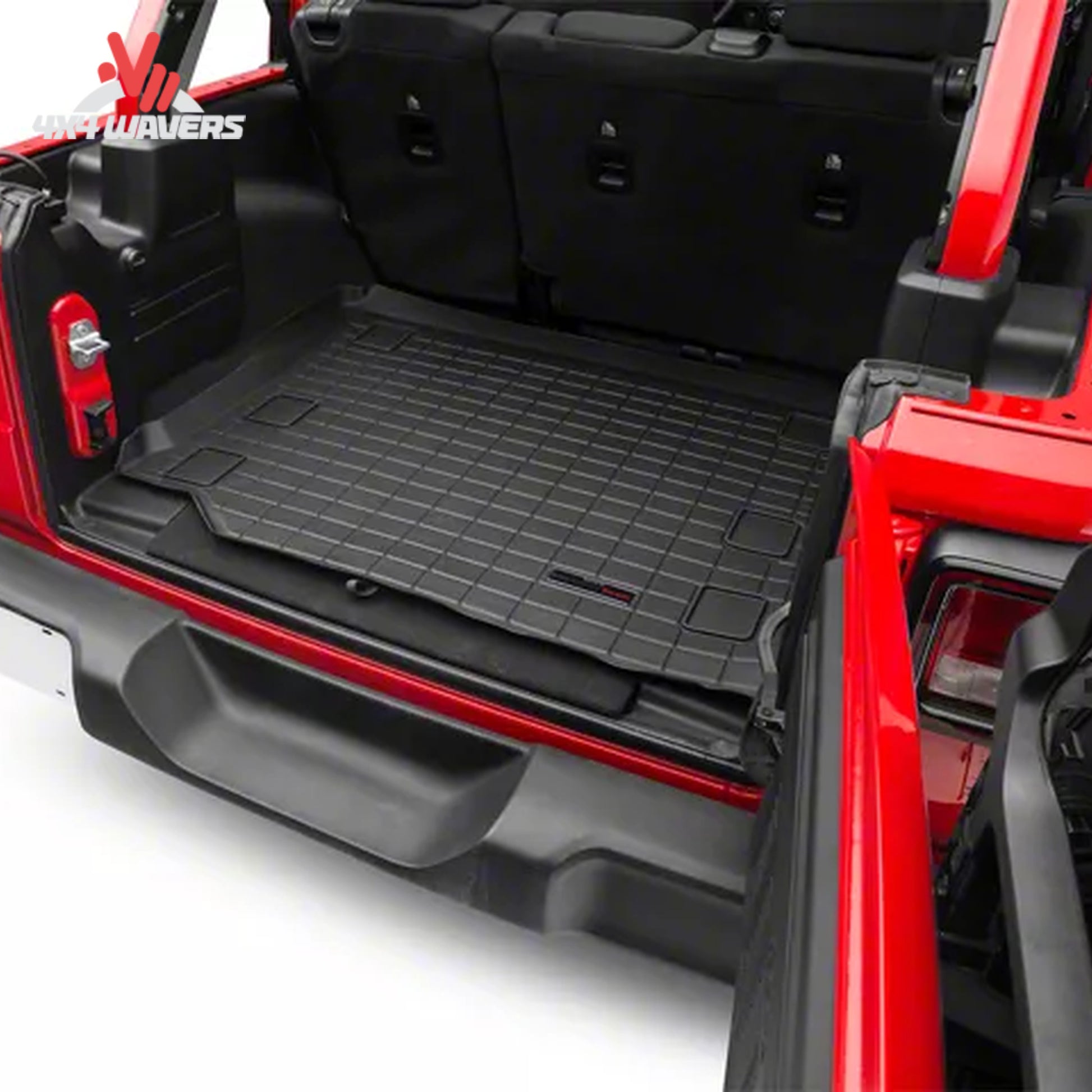 Jeep Wrangler JL Unlimited cargo compartment protected by a WeatherTech cargo liner designed for factory subwoofer applications