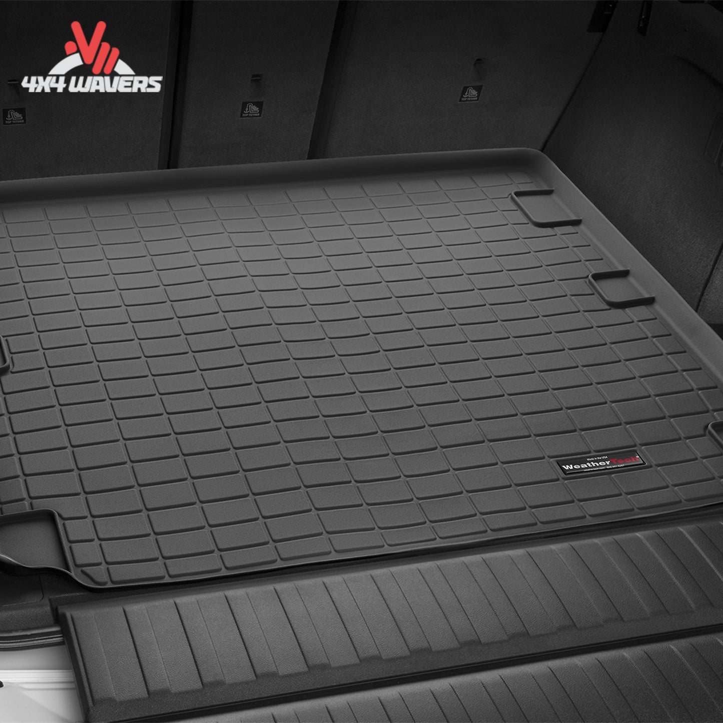 Jeep Wrangler JL Unlimited cargo compartment protected by a WeatherTech cargo liner designed for standard cargo floor configurations