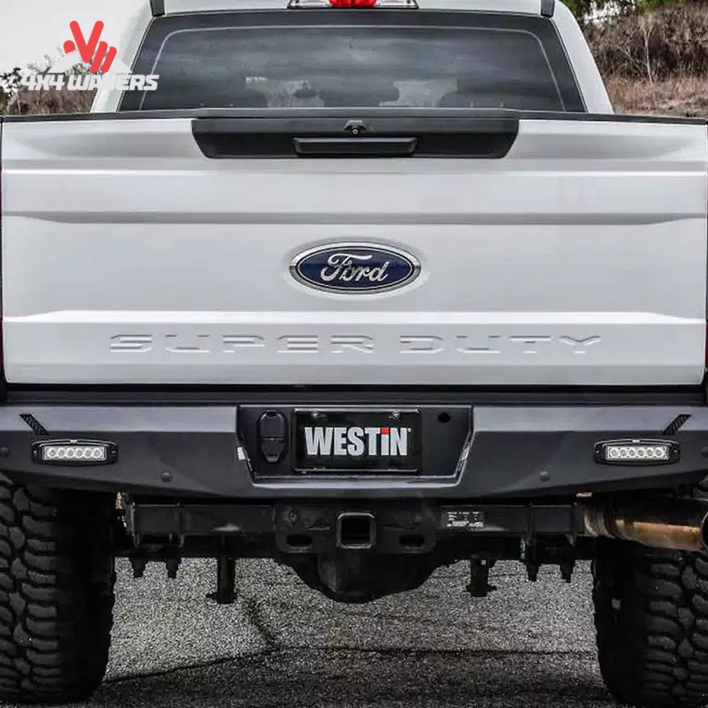Rear view of Ford F150 truck with installed textured black Westin Pro Series steel bumper 58-421015