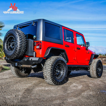 Close-up of the reinforced swing-out tire carrier supporting oversized off-road spare tires