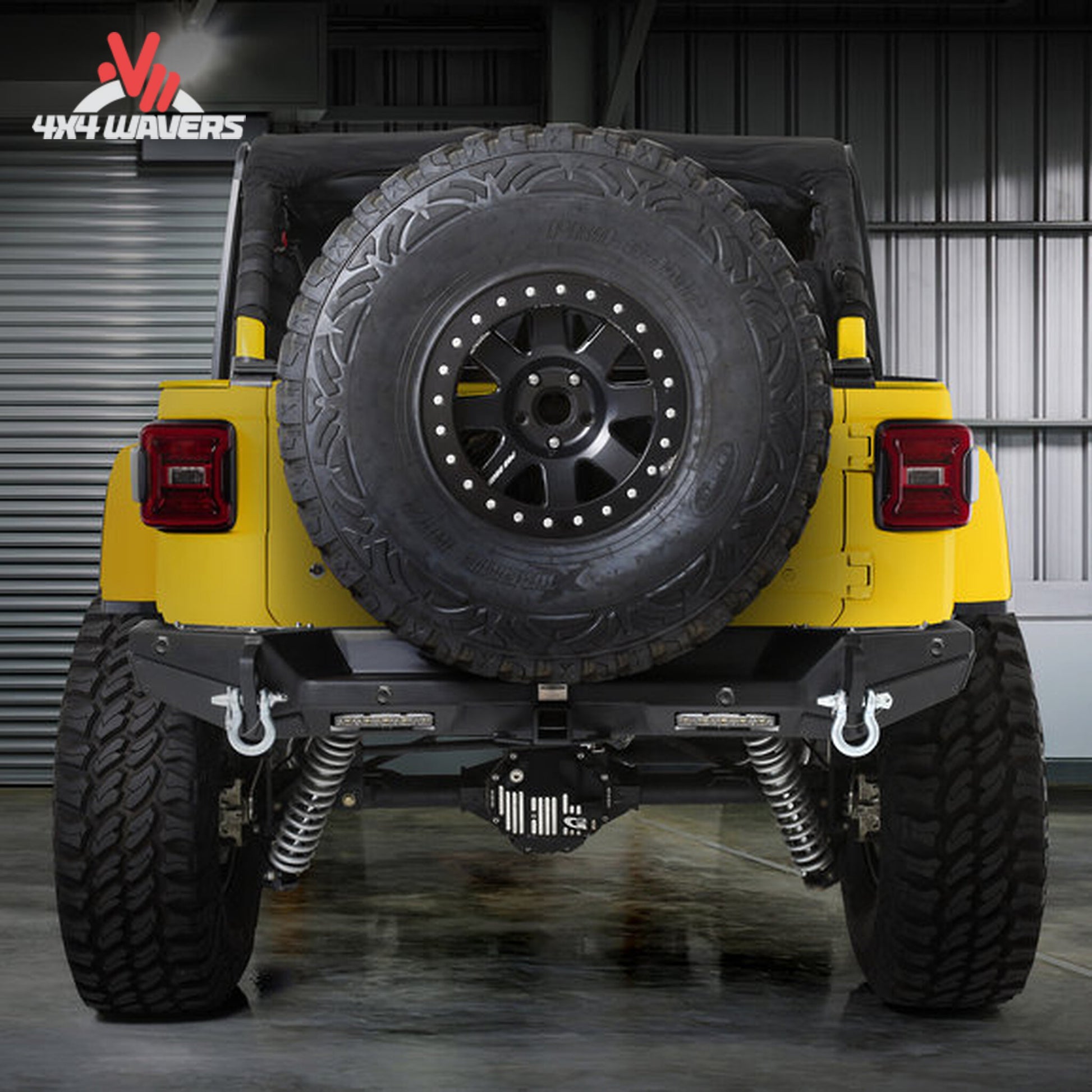 Smittybilt XRC Gen2 rear bumper installed on Jeep Wrangler JL; Jeep Wrangler JL equipped with a trail-ready rear bumper featuring towing and recovery capability