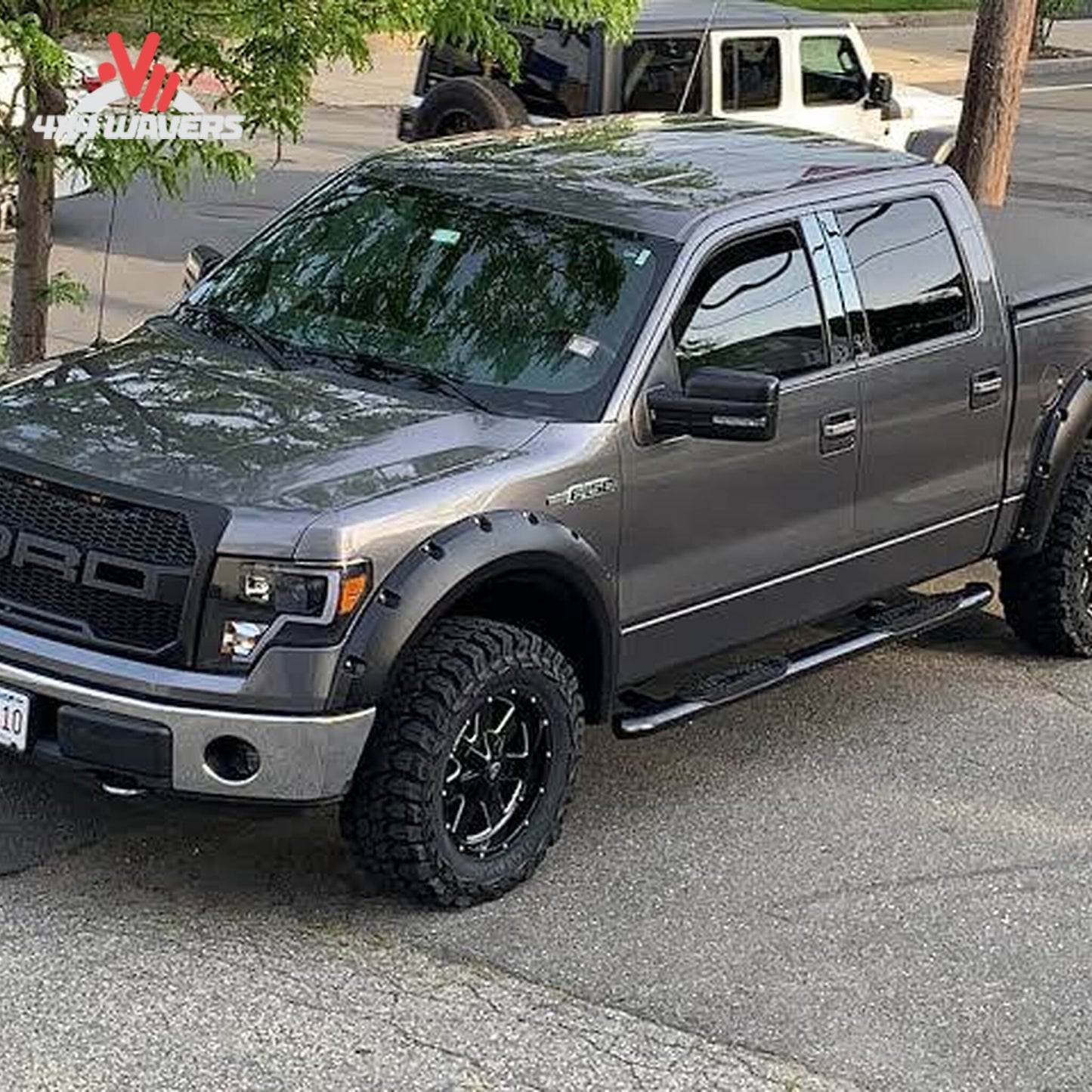 Side profile view of Ford F150 truck with installed 4 piece black pocket flares KF00102