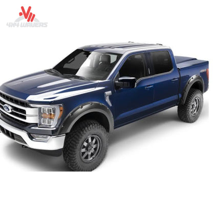 Side stance view of Ford F150 truck with installed 4 piece black pocket flares KF00111